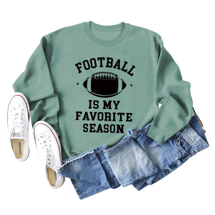 Light green sweater (black font) / S