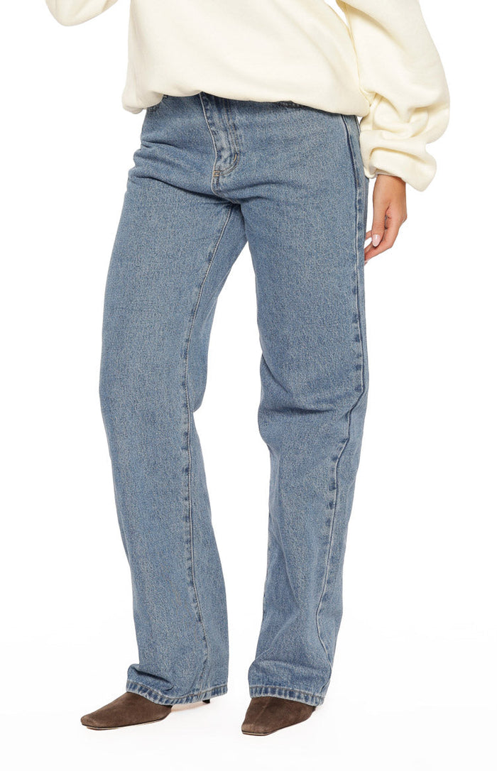 Mid-wash straight leg denim jeans with a visible front button and zipper fly