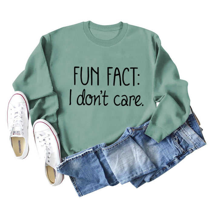 Light green sweater (black font) / S
