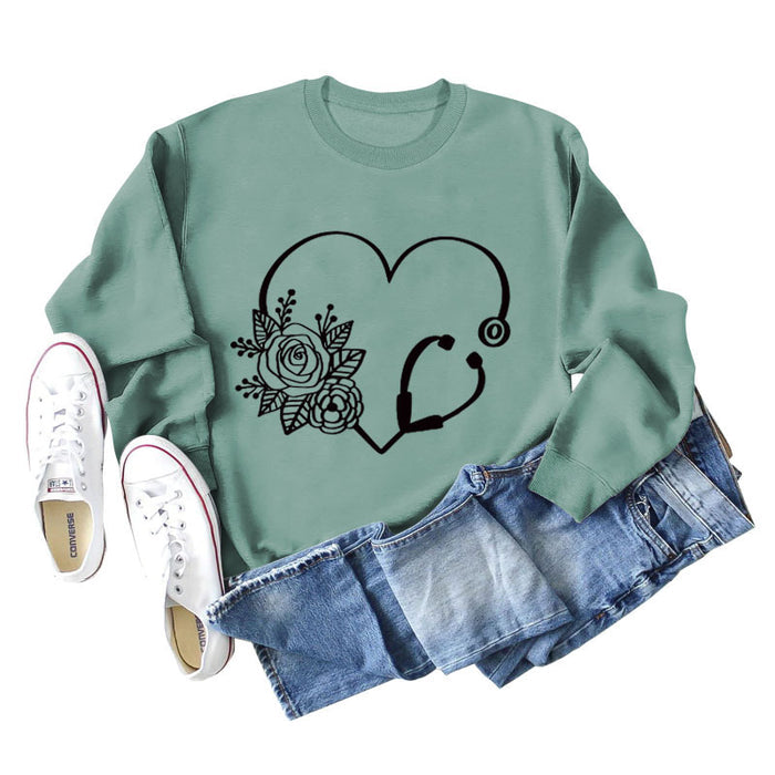 Light green sweater (black font) / S
