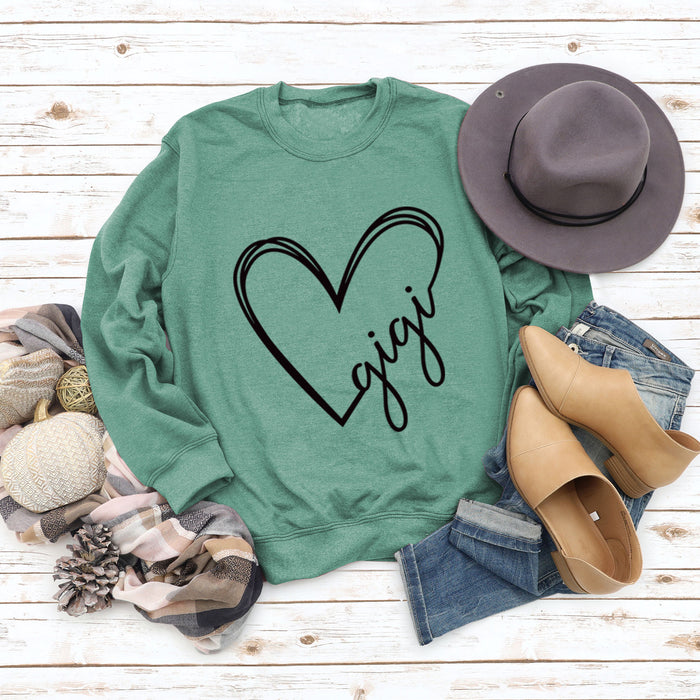Light green sweater (black font) / S