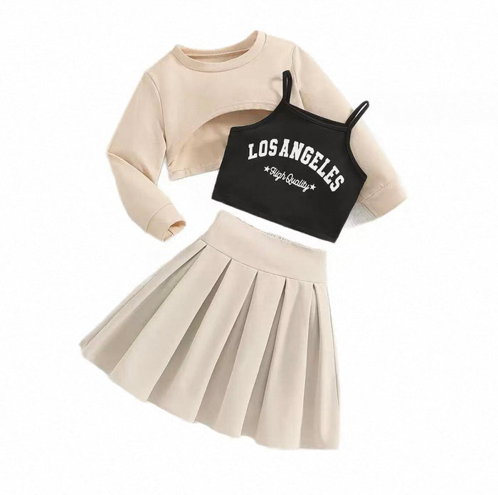 Beige long-sleeve top, black 'Los Angeles' crop top, and beige pleated skirt on a white background