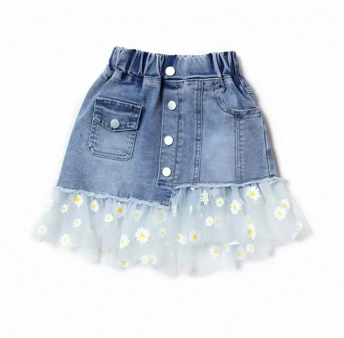 Denim skirt with a floral tulle bottom on a white background