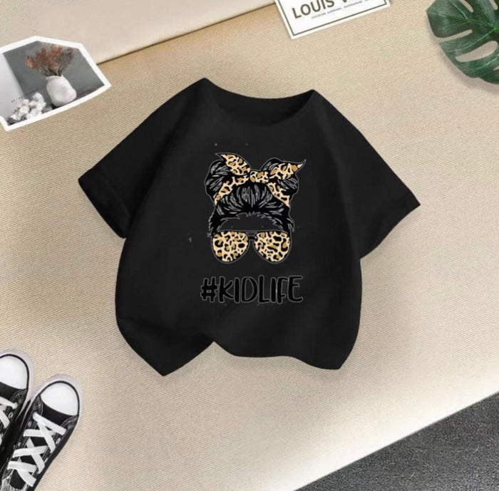 Black sweatshirt with leopard print design and '#KIDLIFE' text on a beige surface.