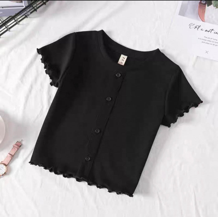 Black short-sleeve cardigan with lace trim on a white surface