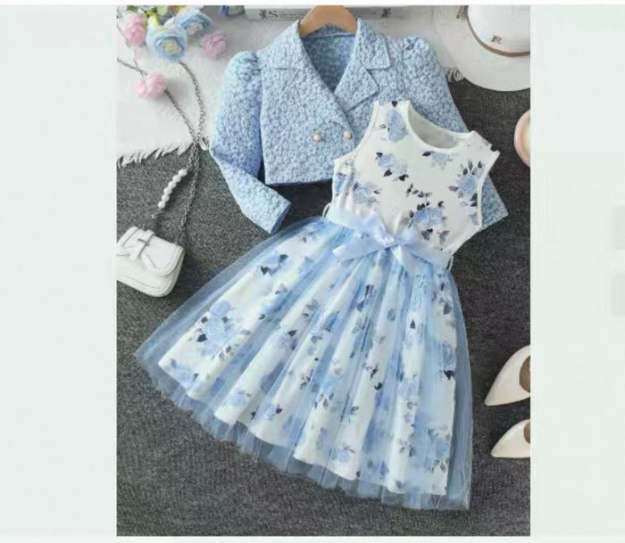 Children's outfit with a blue floral dress and matching coat on a gray surface.