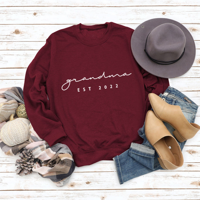 Wine red sweater (white font) / S