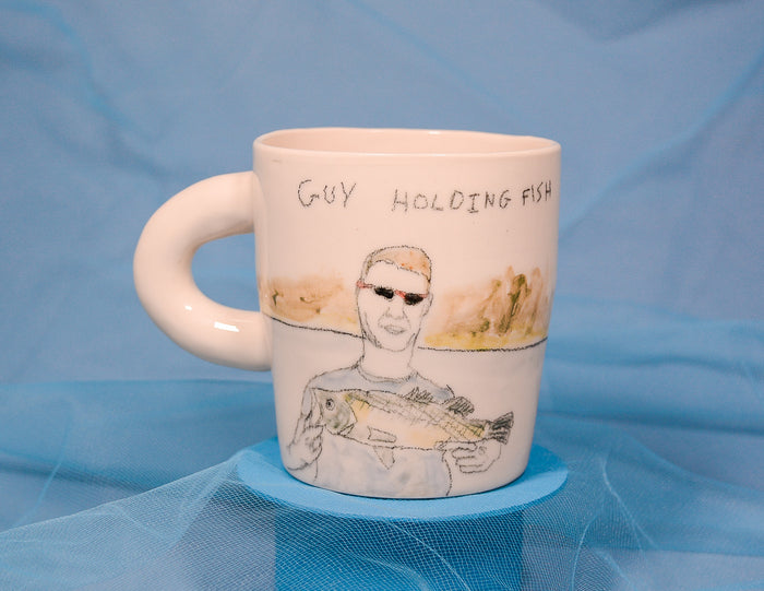 Guy Holding Fish Mug