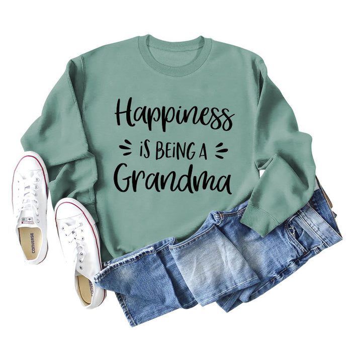 Light green sweater (black font) / S