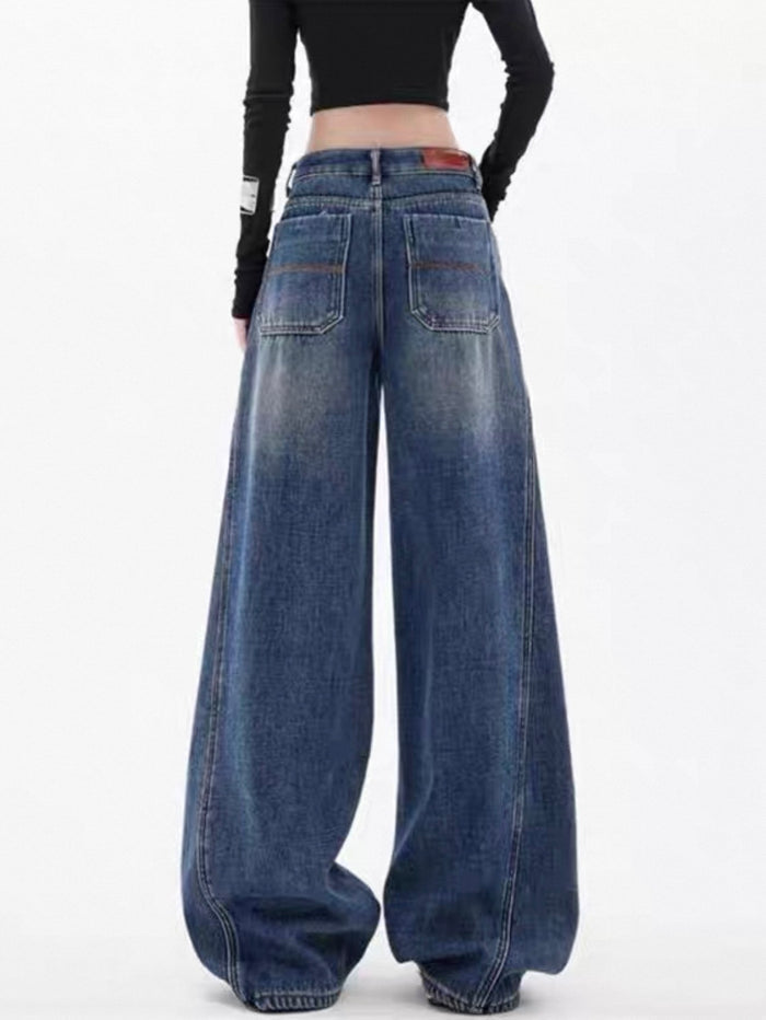 Wide-leg jeans worn by a person on a white background