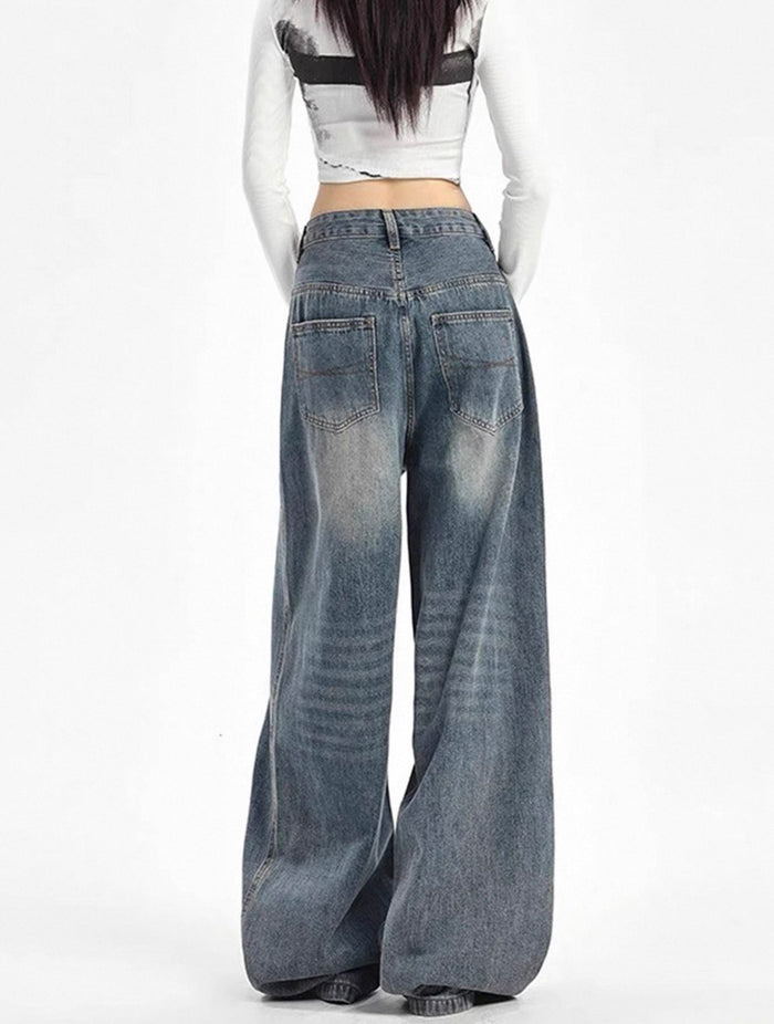 Wide-leg jeans worn by a model on a white background