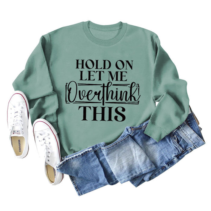 Light green sweater (black font) / S