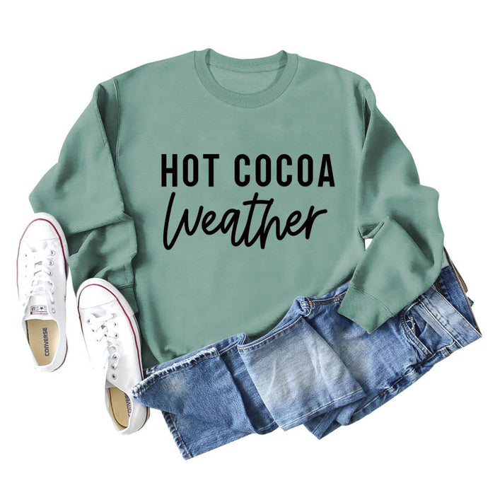 Light green sweater (black font) / S