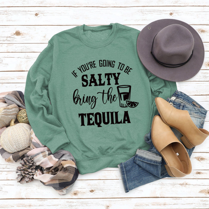 Light green sweater (black font) / S