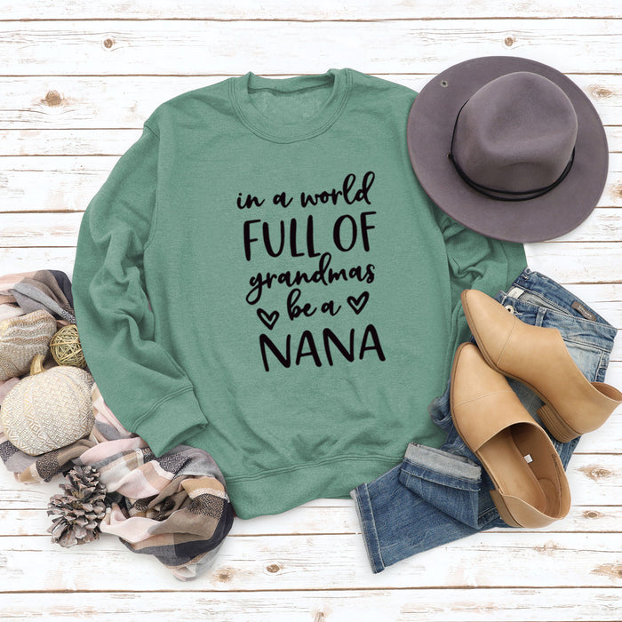 Light green sweater (black font) / S