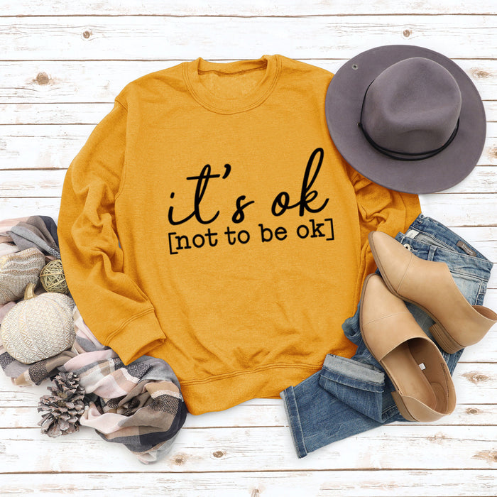 Yellow sweater (black font) / S