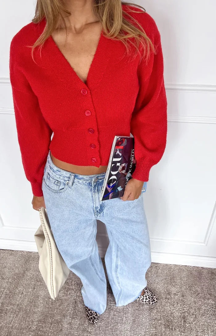 Red fuzzy knit cardigan with a V-neck, button-front, and cropped hem