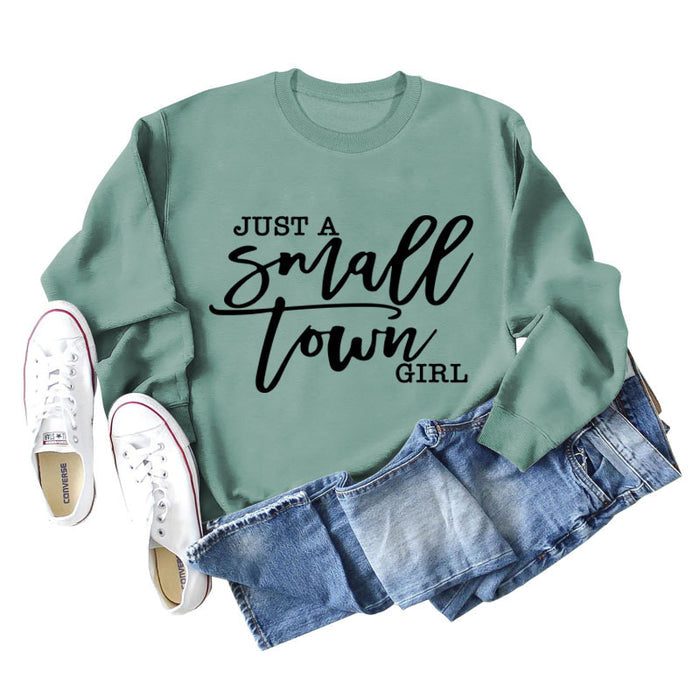 Light green sweater (black font) / S