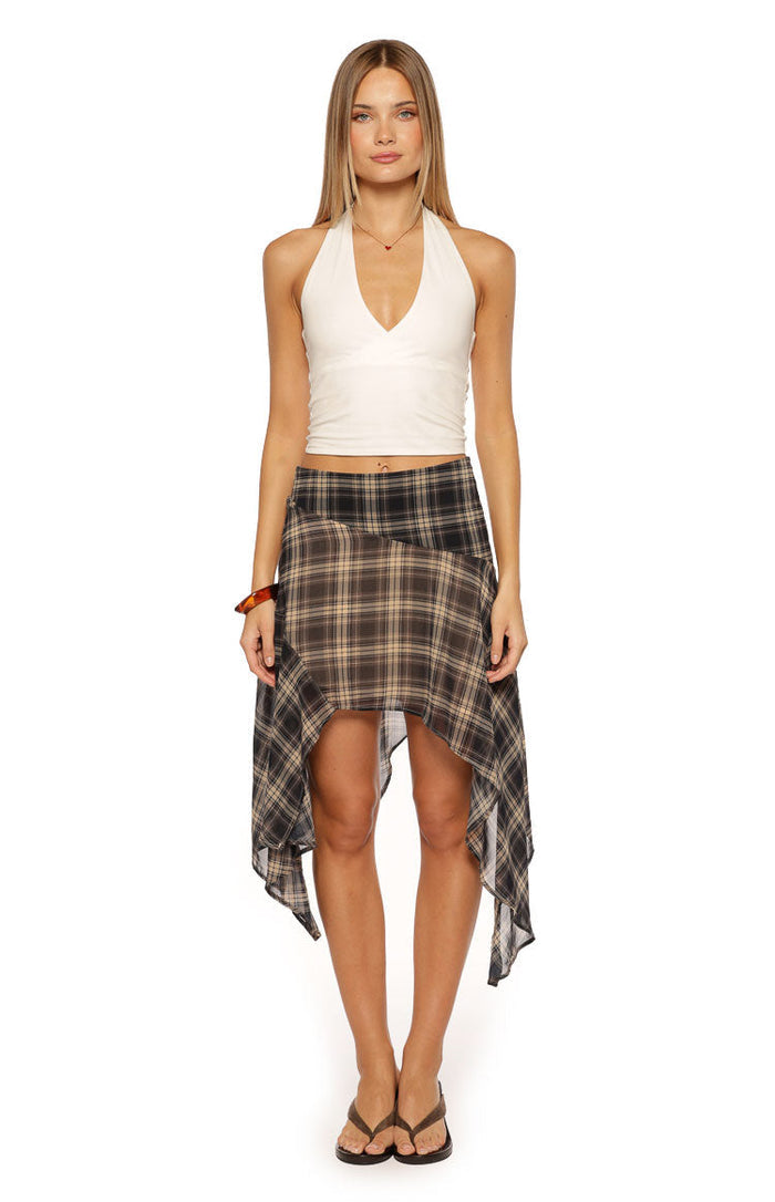 Front view of a sheer brown black and tan plaid midi skirt with an asymmetric hanky hem