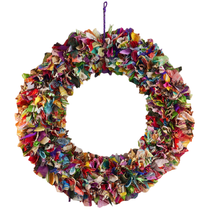 Large multicolor recycled sari fabric wreath handmade in India from colorful reclaimed textile remnants.