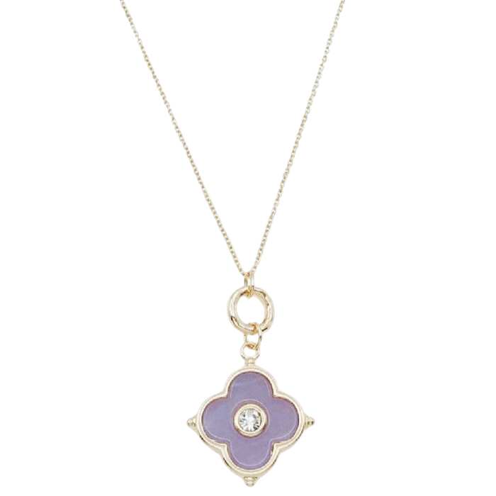 Lavender enamel clover charm necklace with rhinestone accents on a delicate gold-tone chain