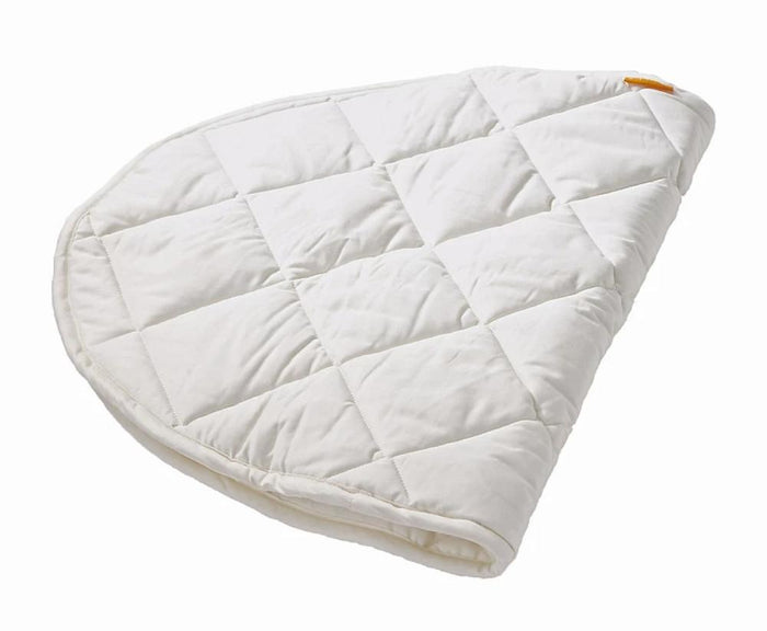 Quilted white mattress pad on Leander Classic Cot organic mattress protector for baby strollers