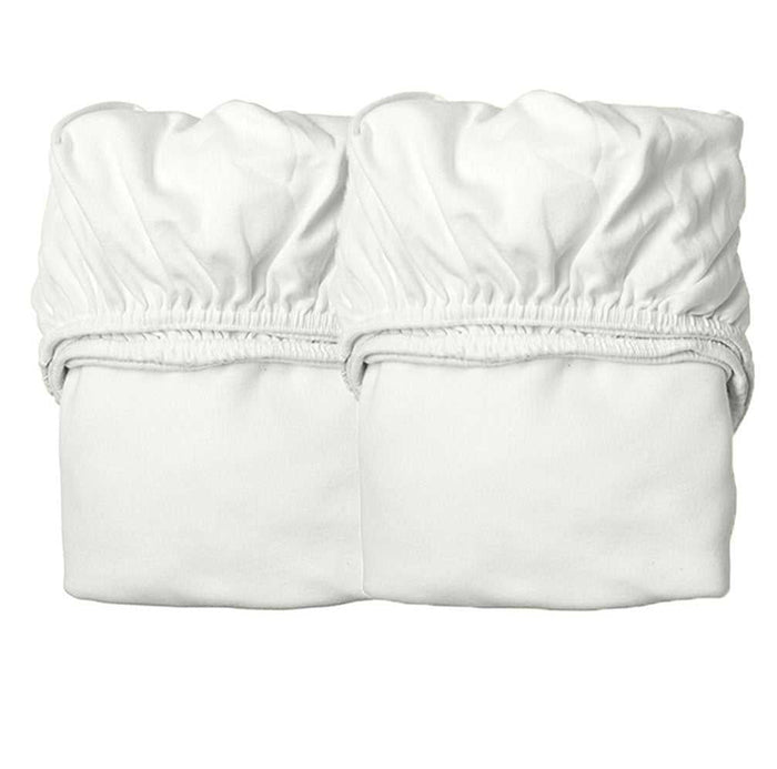Two folded white organic fitted sheets for Leander Junior Bed or Luna Cot Mattress