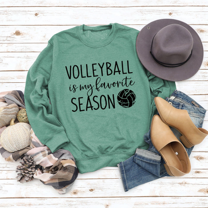 Light green sweater (black font) / S