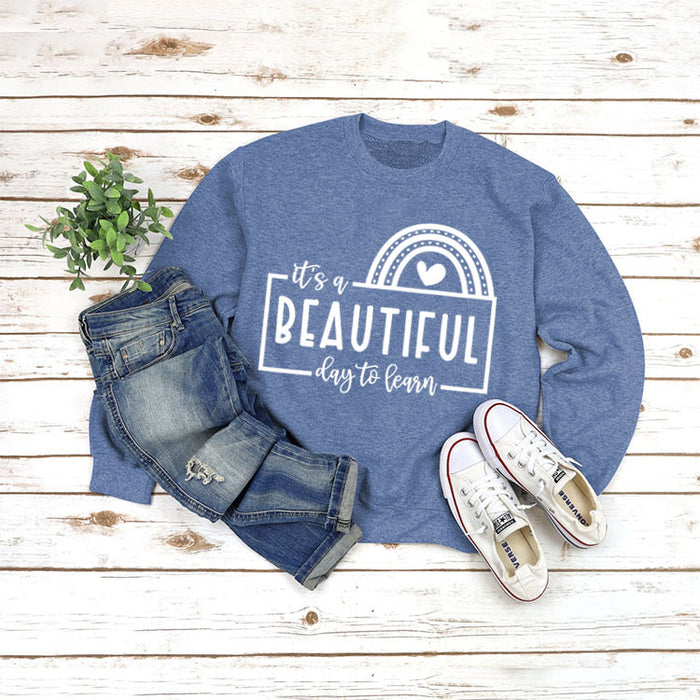 Blue sweater (white font) / S
