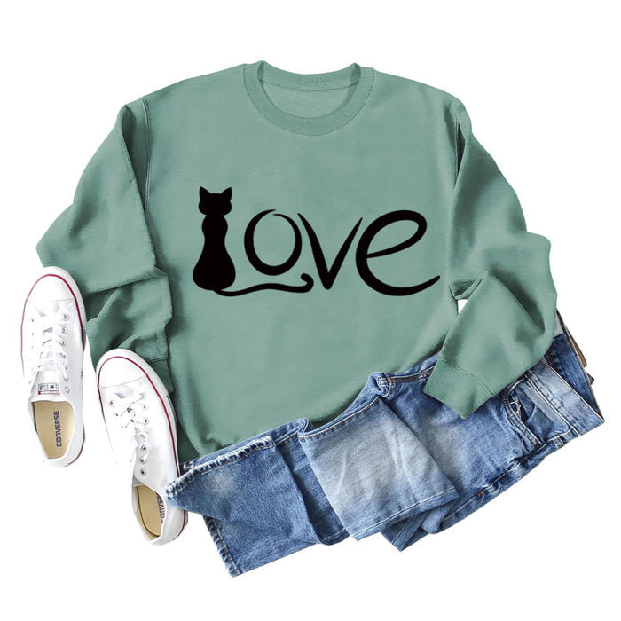 Light green sweater (black font) / S