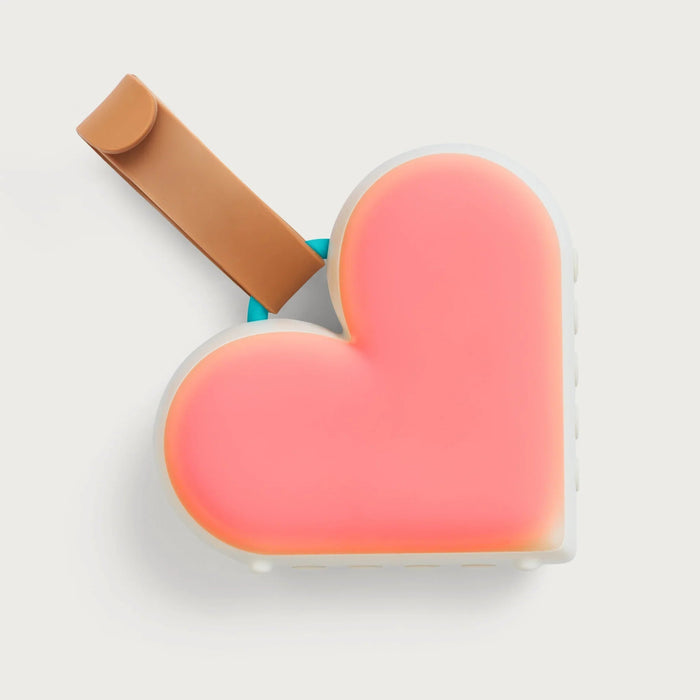 Pink heart-shaped luggage tag with brown strap for Love to Dream Sleep Machine accessory