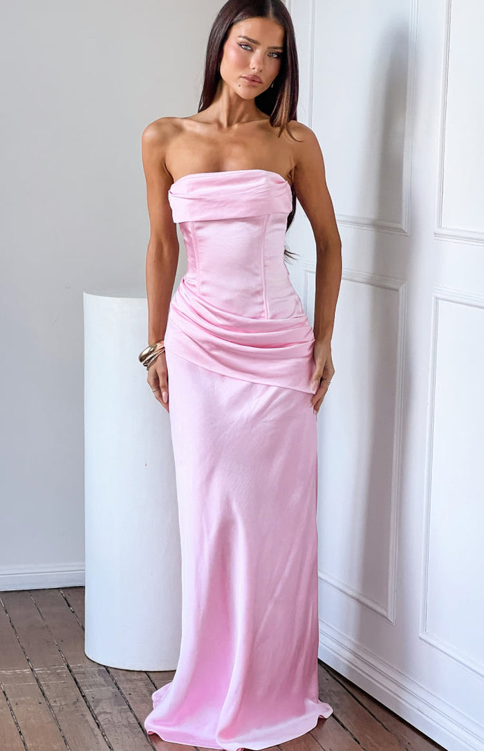 Pink satin strapless maxi dress with a draped neckline, corset-style bodice, and ruched waist detail