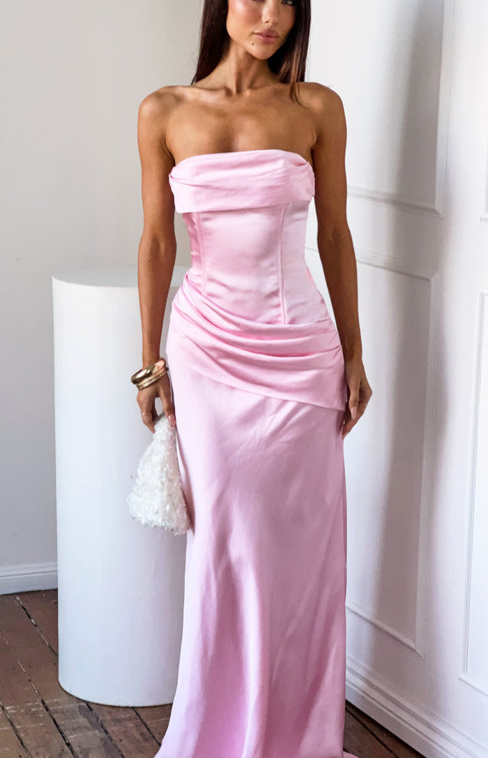 Pink satin strapless maxi dress with a structured corset bodice and draped hip detail