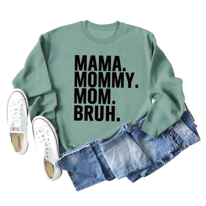 Light green sweater (black font) / L