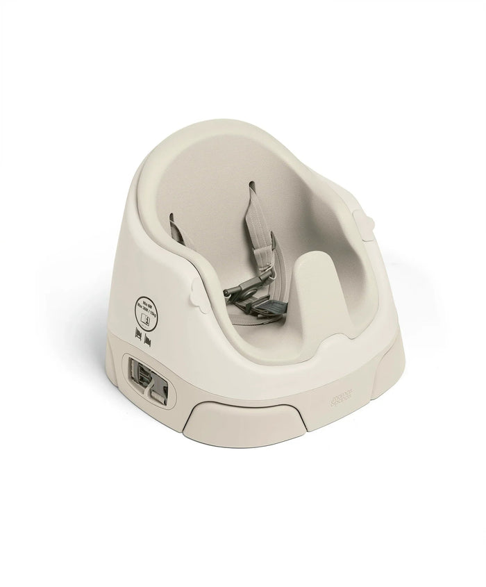 Beige baby booster seat with safety straps from Mamas & Papas Bug 3-in-1 Floor Seat