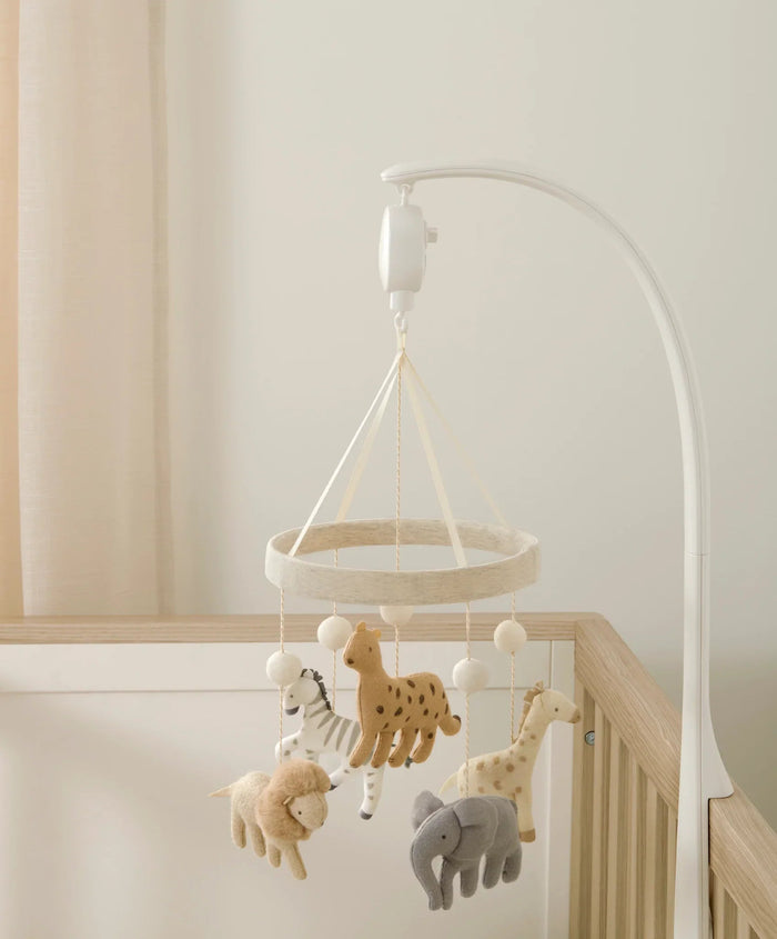Safari animal baby mobile from Mamas & Papas is a musical cot mobile featuring handcrafted toshi baby designs