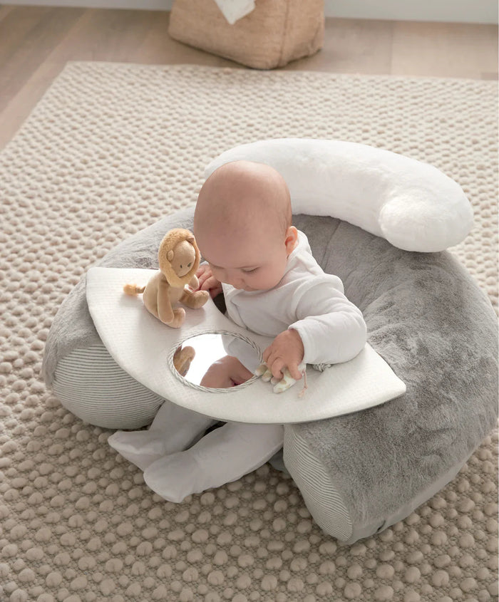 Cute baby in MaMas & Papas Sit & Play baby floor seat, perfect for play baby floor fun