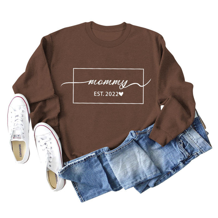 Coffee colored sweater (white font) / S