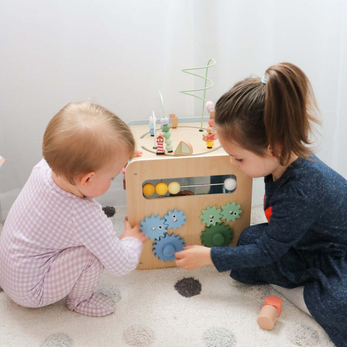 Wooden activity cube.