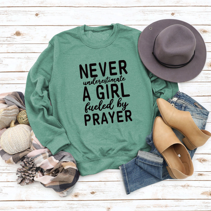 Light green sweater (black font) / S