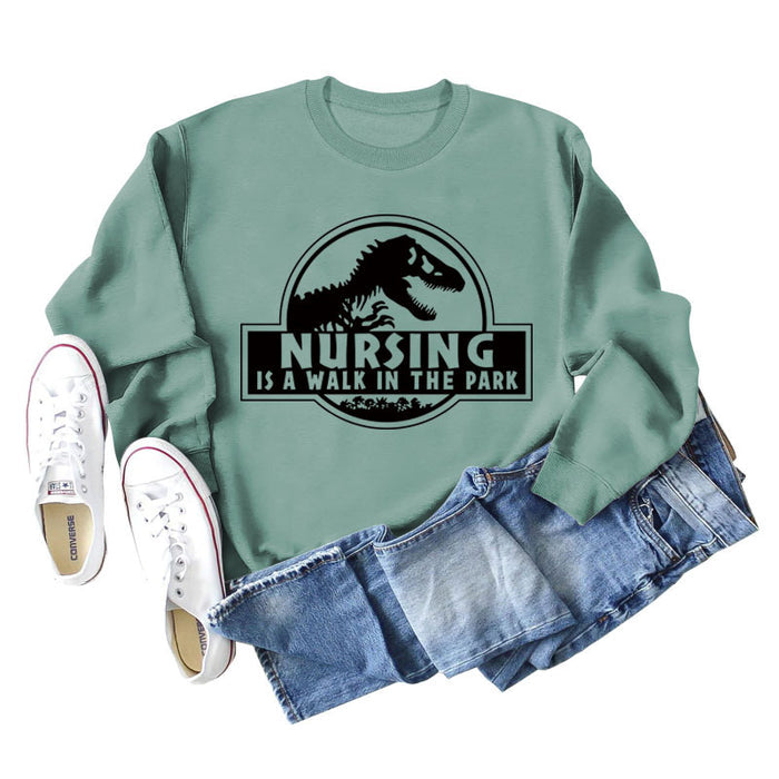 Light green sweater (black font) / S