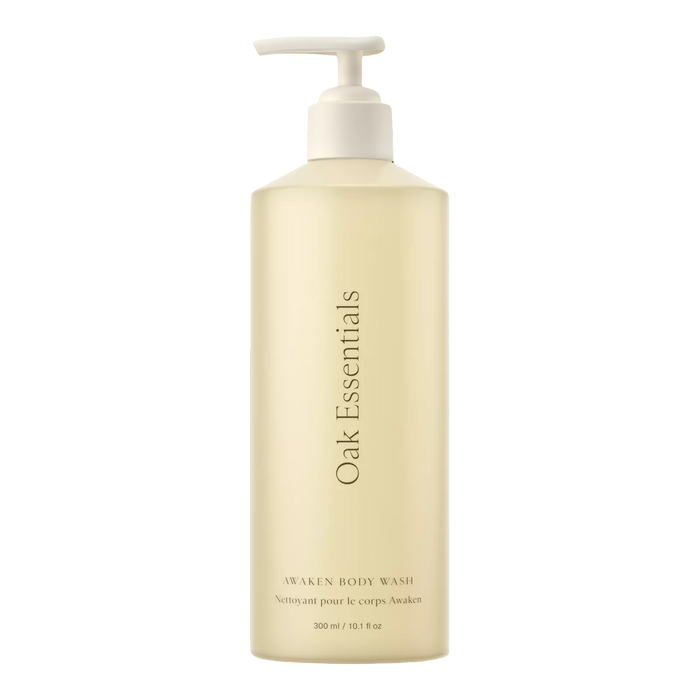 Body wash bottle with pump labeled 'Oak Essentials' on a white background