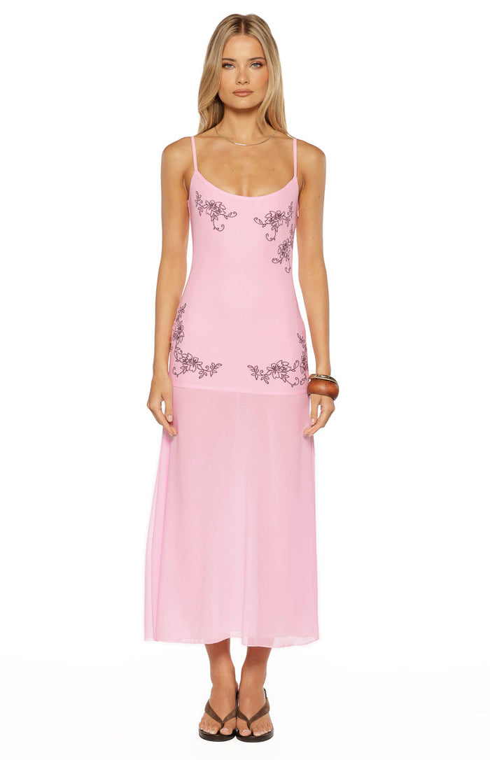 Front view of a light pink sleeveless midi dress with dark floral embroidery on the bodice and a sheer flowy skirt