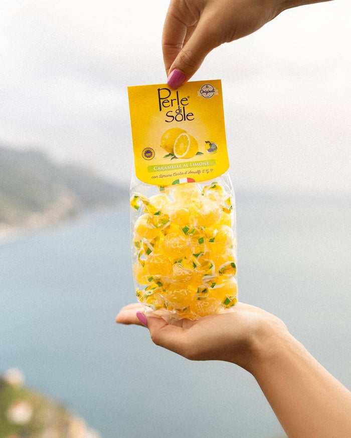 Bag of Perle di Sole Original Amalfi Coast lemon drops in yellow packaging with individually wrapped lemon candies