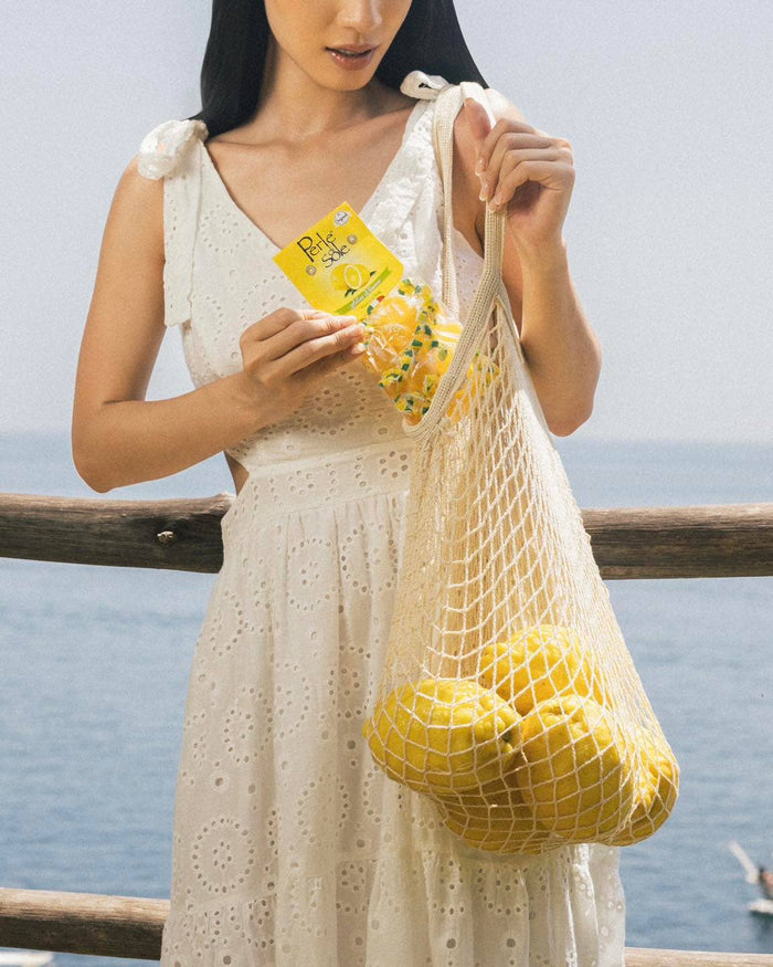 Bag of Perle di Sole Original Amalfi Coast lemon drops in yellow packaging with individually wrapped lemon candies