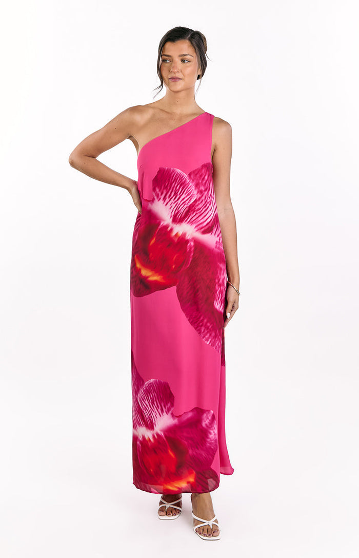 Pink one-shoulder maxi dress with large red and pink orchid print