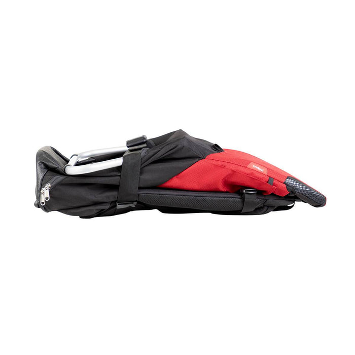 Folded Phil&Teds parade stroller with red and black colors for easy storage