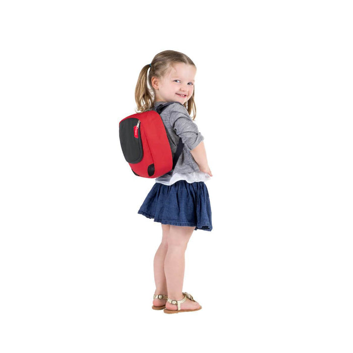 Little girl with red backpack near Toshi Baby Romper and Odyssey Wagon Wheels baby strollers