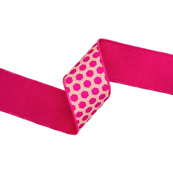 Pink ribbon with a geometric patterned end on a white background