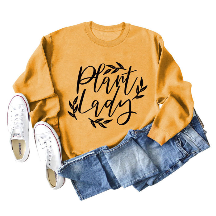 Yellow sweater (black font) / S